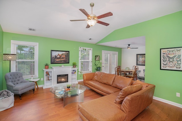 1280 Kennecott Way, Lexington, KY 40514 - living area with a ceiling fan, lofted ceiling, wood finished floors, and a warm lit fireplace