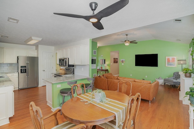 1280 Kennecott Way, Lexington, KY 40514 - dining room featuring a ceiling fan, light wood-style flooring, and lofted ceiling