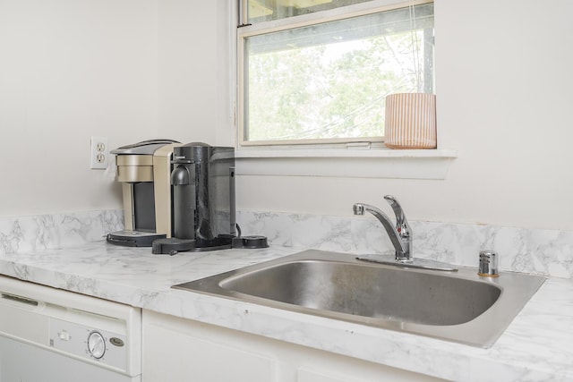 421 Redding Rd Unit 56, Lexington, KY 40517 - kitchen view of a sink and white cabinets