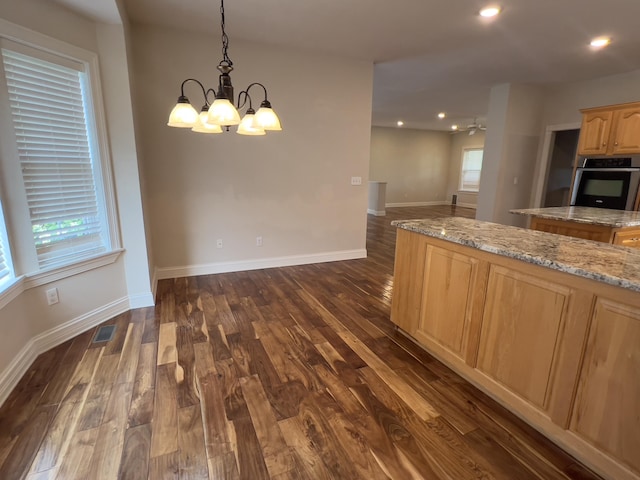 131 Betsy Ross Ln, Danville, KY 40422 - kitchen featuring stainless steel oven, a chandelier, light brown cabinetry, dark wood-type flooring, and light stone countertops