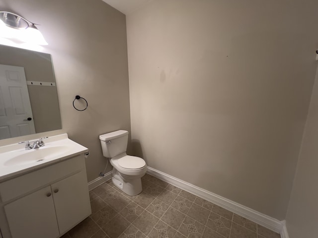 131 Betsy Ross Ln, Danville, KY 40422 - bathroom featuring toilet, vanity, and baseboards