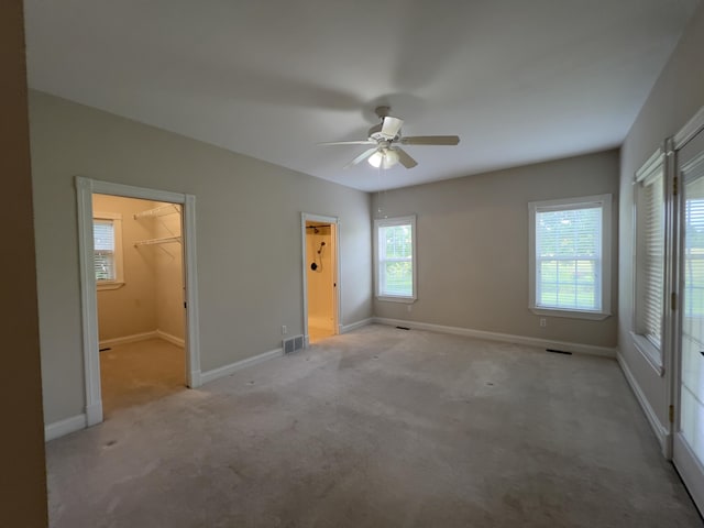 131 Betsy Ross Ln, Danville, KY 40422 - unfurnished bedroom with light colored carpet, baseboards, a spacious closet, and connected bathroom