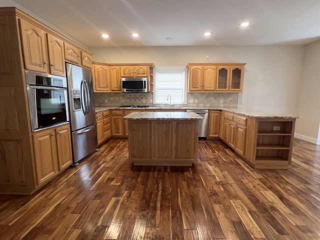 131 Betsy Ross Ln, Danville, KY 40422 - kitchen with stainless steel appliances, open shelves, dark wood-type flooring, a peninsula, and light stone counters