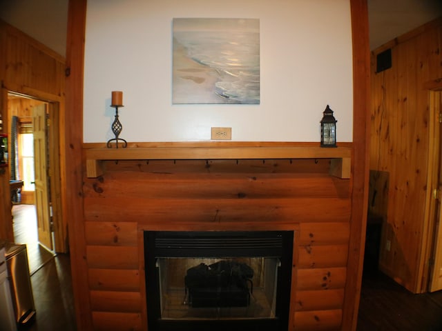 16 Hardwood Hl, Salt Lick, KY 40371 - detailed view of log walls, wood finished floors, a fireplace, and wood walls