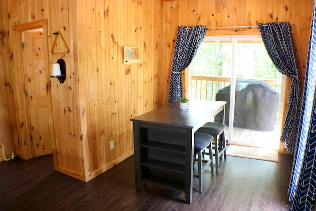 16 Hardwood Hl, Salt Lick, KY 40371 - dining area featuring dark wood-style flooring and wood walls