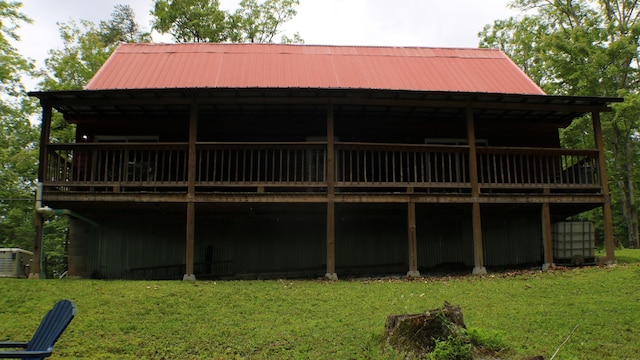16 Hardwood Hl, Salt Lick, KY 40371 - back of property featuring a yard, a deck, and metal roof