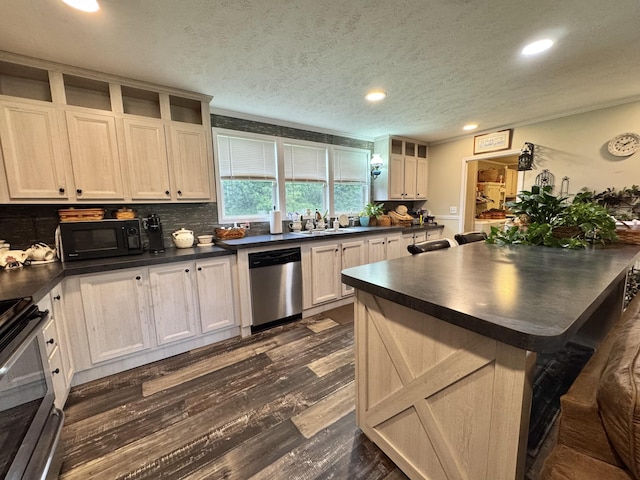 115 Wolf Creek Crossing Rd, Nancy, KY 42544 - kitchen featuring appliances with stainless steel finishes, dark countertops, dark wood-style flooring, recessed lighting, and a textured ceiling