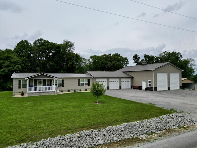 115 Wolf Creek Crossing Rd, Nancy, KY 42544 - single story home with covered porch, a front lawn, and a metal roof