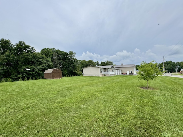 115 Wolf Creek Crossing Rd, Nancy, KY 42544 - view of grassy yard with a shed