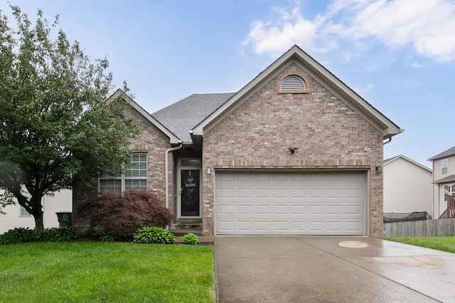 3008 Roundway Down Ln, Lexington, KY 40509 - view of front of home featuring brick siding, driveway, and an attached garage