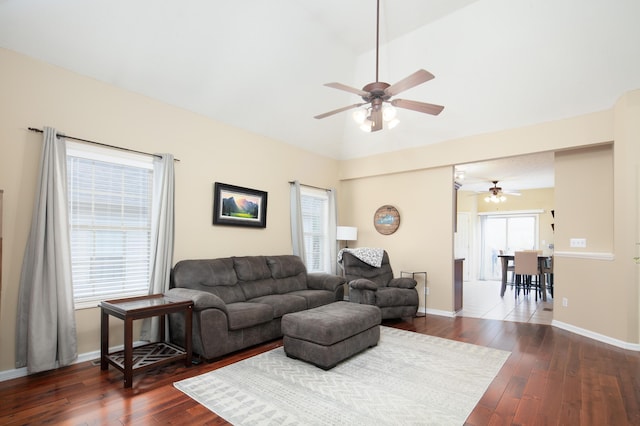 3008 Roundway Down Ln, Lexington, KY 40509 - living area featuring a ceiling fan, dark wood-style flooring, vaulted ceiling, and baseboards