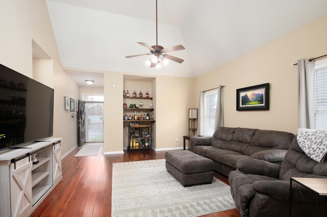 3008 Roundway Down Ln, Lexington, KY 40509 - living area with a bar, ceiling fan, lofted ceiling, dark wood-style floors, and healthy amount of natural light