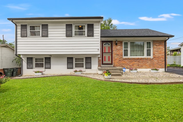 1716 Biloxi Ct, Lexington, KY 40505 - tri-level home with a front lawn, brick siding, and a shingled roof