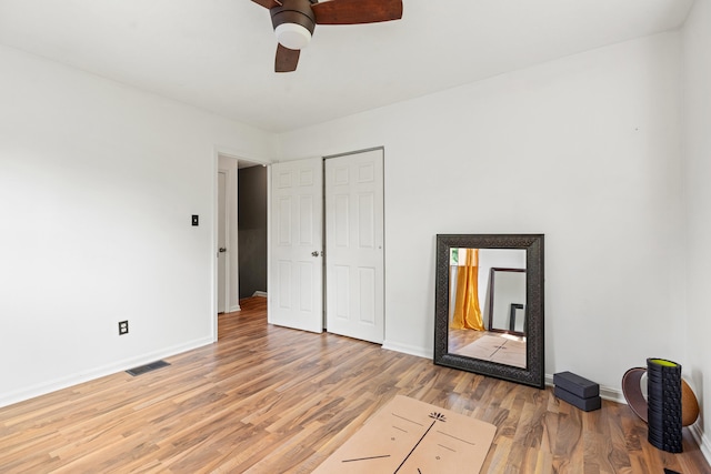 1716 Biloxi Ct, Lexington, KY 40505 - unfurnished bedroom featuring light wood-style flooring, baseboards, ceiling fan, and a closet