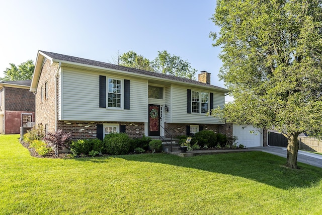 4029 Elora Ln, Lexington, KY 40515 - raised ranch with a garage, a chimney, driveway, and a front lawn