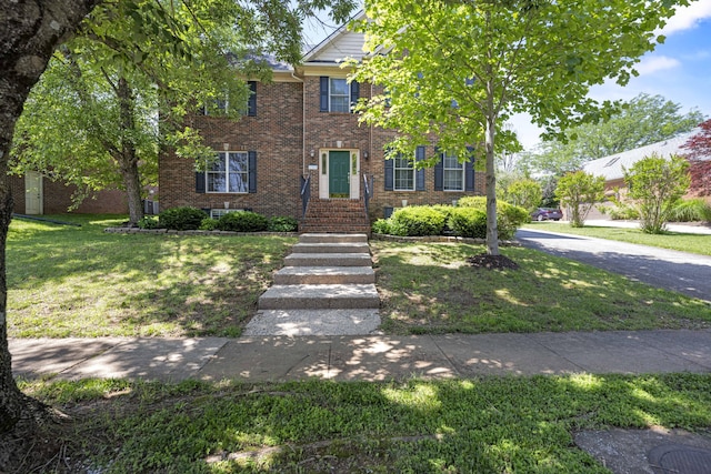 1369 Saddle Club Way, Lexington, KY 40504 - view of front of house featuring a front lawn and brick siding
