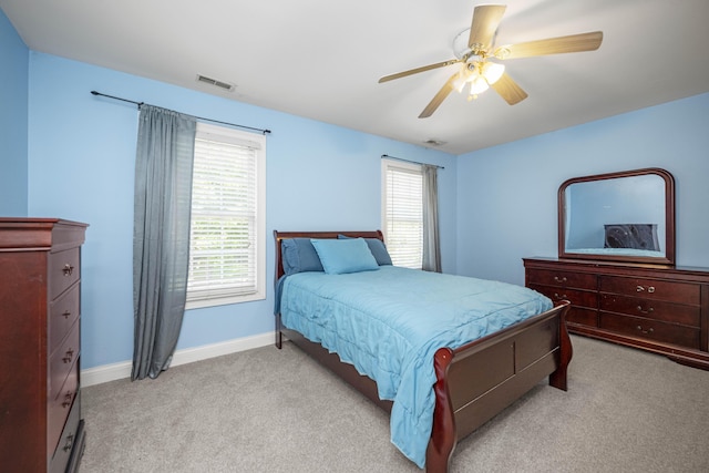 1369 Saddle Club Way, Lexington, KY 40504 - bedroom featuring light colored carpet, multiple windows, and ceiling fan