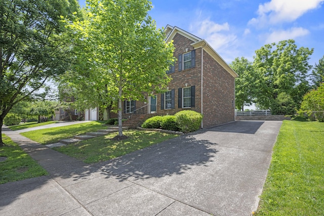 1369 Saddle Club Way, Lexington, KY 40504 - view of front facade featuring concrete driveway, brick siding, and a garage