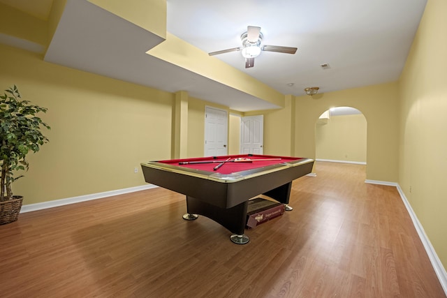 1369 Saddle Club Way, Lexington, KY 40504 - playroom with arched walkways, a ceiling fan, wood finished floors, and baseboards