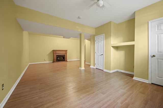 1369 Saddle Club Way, Lexington, KY 40504 - unfurnished living room with a ceiling fan, light wood finished floors, a fireplace, and baseboards