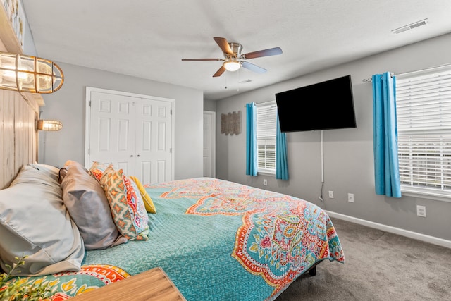 416 Scottsdale Cir, Lexington, KY 40511 - bedroom featuring carpet flooring, multiple windows, a ceiling fan, and a closet