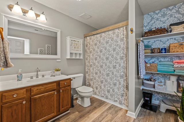 416 Scottsdale Cir, Lexington, KY 40511 - full bathroom featuring vanity, wood finished floors, curtained shower, and a textured ceiling