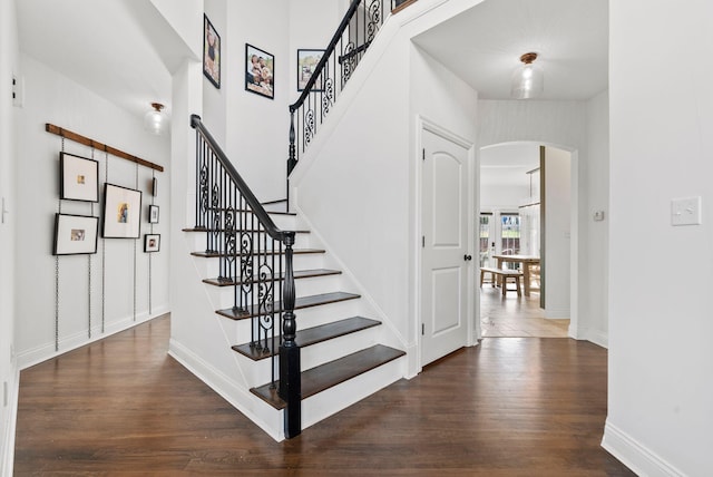 1022 Forest Hill Dr, Lawrenceburg, KY 40342 - stairway featuring arched walkways and wood finished floors