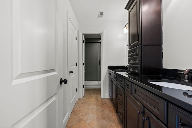 1022 Forest Hill Dr, Lawrenceburg, KY 40342 - full bath featuring an enclosed shower, double vanity, and stone finish floors