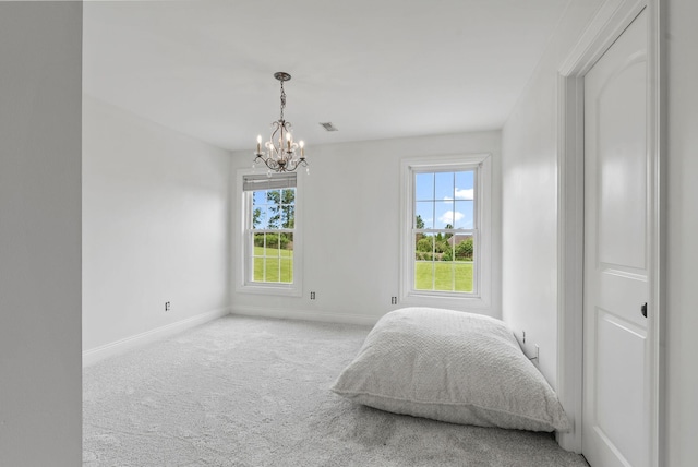 1022 Forest Hill Dr, Lawrenceburg, KY 40342 - bedroom featuring multiple windows, a chandelier, and carpet floors