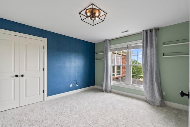 1022 Forest Hill Dr, Lawrenceburg, KY 40342 - unfurnished bedroom featuring carpet flooring and a closet
