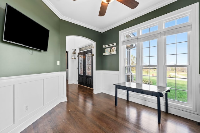 1022 Forest Hill Dr, Lawrenceburg, KY 40342 - hallway featuring arched walkways, healthy amount of natural light, crown molding, dark wood-type flooring, and a wainscoted wall
