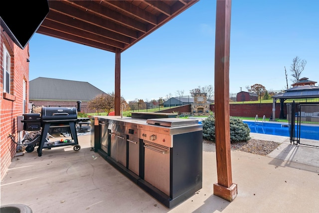 1022 Forest Hill Dr, Lawrenceburg, KY 40342 - view of patio / terrace featuring a gazebo and an outdoor kitchen