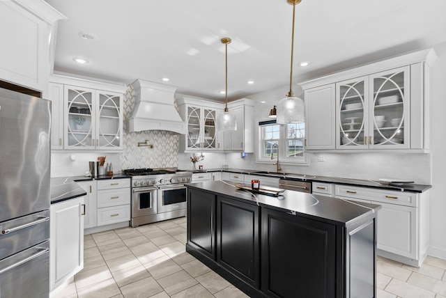 1022 Forest Hill Dr, Lawrenceburg, KY 40342 - kitchen with stainless steel appliances, custom range hood, dark countertops, backsplash, and recessed lighting
