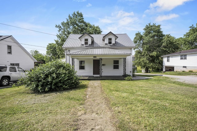 460 Spring St, Mt Sterling, KY 40353 - view of front of home featuring covered porch, a metal roof, and a front yard