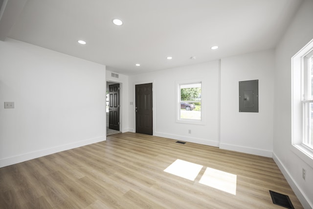 460 Spring St, Mt Sterling, KY 40353 - unfurnished room with electric panel, light wood finished floors, and recessed lighting