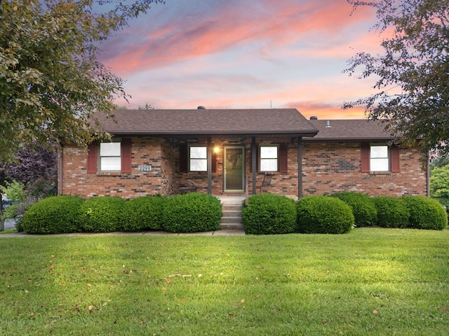 2299 Mcbrayer Rd, Clearfield, KY 40313 - single story home with a front lawn and brick siding