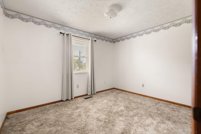 2299 Mcbrayer Rd, Clearfield, KY 40313 - carpeted empty room featuring a textured ceiling and baseboards