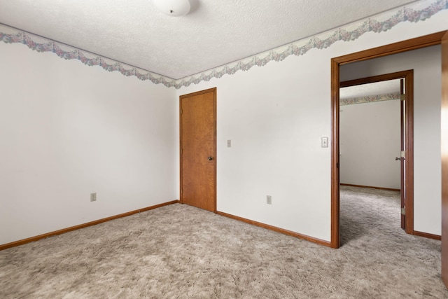 2299 Mcbrayer Rd, Clearfield, KY 40313 - carpeted empty room with a textured ceiling and baseboards