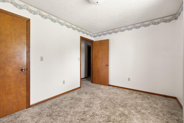 2299 Mcbrayer Rd, Clearfield, KY 40313 - empty room featuring a textured ceiling and carpet