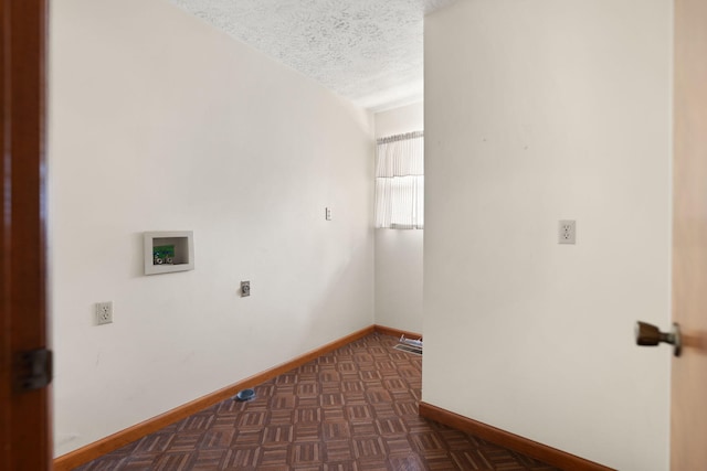 2299 Mcbrayer Rd, Clearfield, KY 40313 - laundry room with hookup for a washing machine, a textured ceiling, and electric dryer hookup