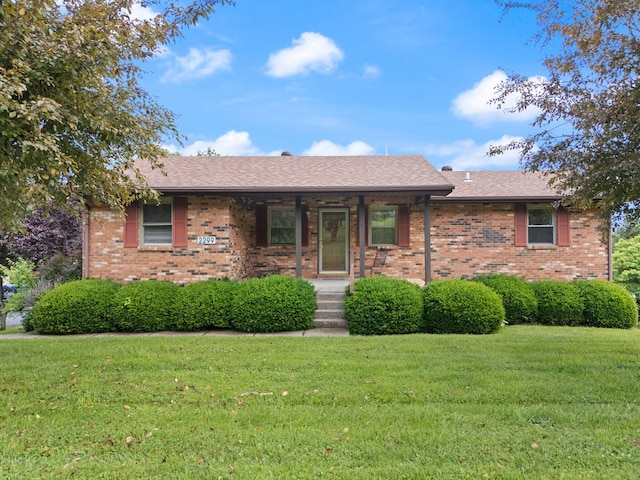2299 Mcbrayer Rd, Clearfield, KY 40313 - ranch-style house featuring a front yard, brick siding, and a shingled roof