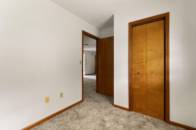 2299 Mcbrayer Rd, Clearfield, KY 40313 - unfurnished bedroom with light colored carpet and a closet