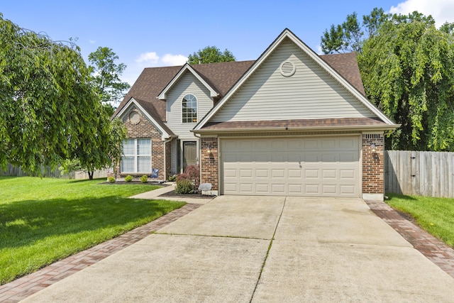 102 Dickinson Ct, Georgetown, KY 40324 - traditional-style house with driveway, brick siding, a garage, and roof with shingles