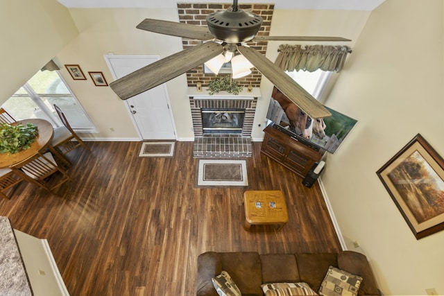 102 Dickinson Ct, Georgetown, KY 40324 - living area featuring wood finished floors, a ceiling fan, and a brick fireplace