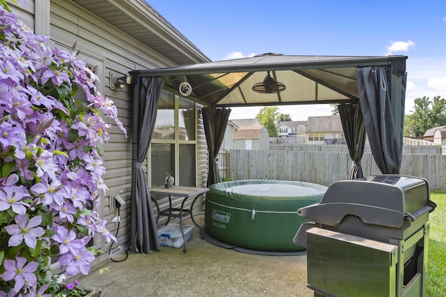 102 Dickinson Ct, Georgetown, KY 40324 - view of patio with a gazebo, a hot tub, and a grill