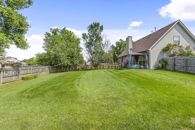 102 Dickinson Ct, Georgetown, KY 40324 - fenced backyard with a gazebo