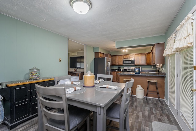1390 Ky Highway 698, Stanford, KY 40484 - dining area featuring dark wood-type flooring and a textured ceiling