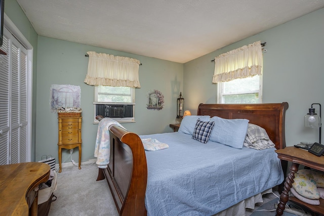 1390 Ky Highway 698, Stanford, KY 40484 - bedroom featuring multiple windows, cooling unit, carpet floors, and a closet