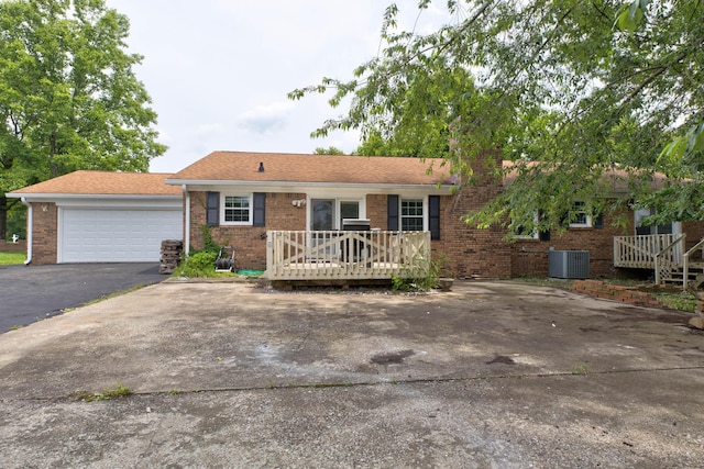 230 Fairway Dr, Nicholasville, KY 40356 - ranch-style home featuring brick siding, a deck, and a garage