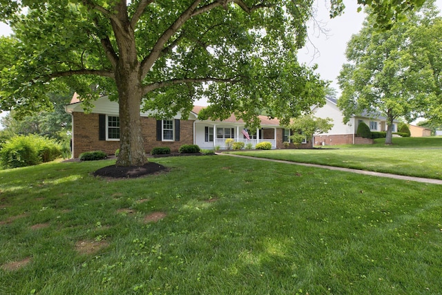 230 Fairway Dr, Nicholasville, KY 40356 - view of front facade with brick siding and a front yard